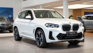 BMW iX3 2026 vue de face en exposition dans un showroom BMW en France